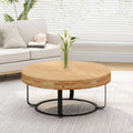 Table basse ronde moderne avec motif de sculpture sur bois et pieds en métal