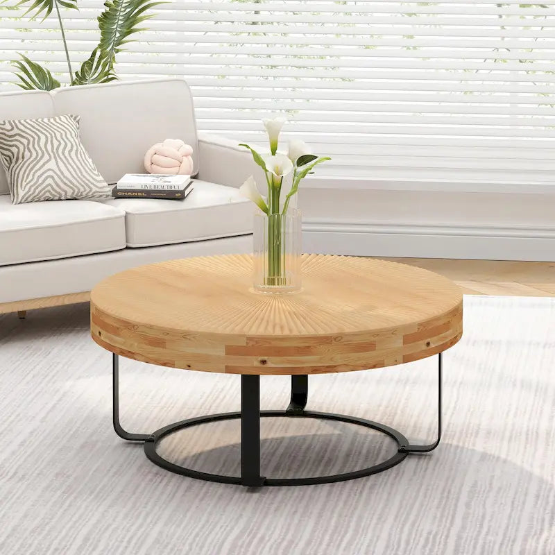 Table basse ronde moderne avec motif de sculpture sur bois et pieds en métal