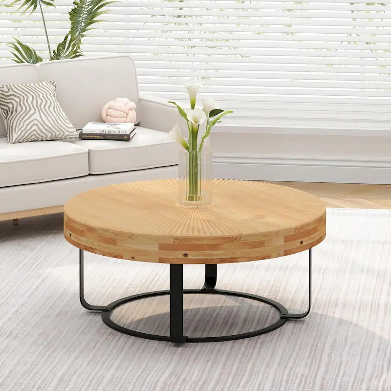 Table basse ronde moderne avec motif de sculpture sur bois et pieds en métal